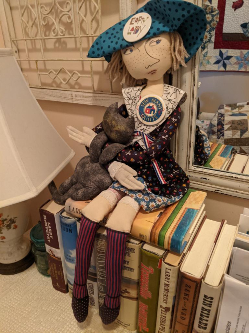 Doll and cat